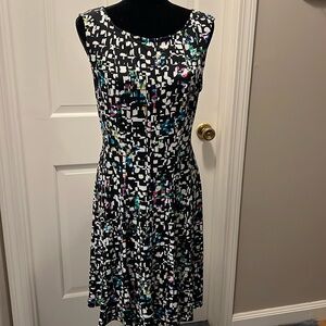 Connected Apparel vintage fit and flare black print dress. Size 12 in EUC.